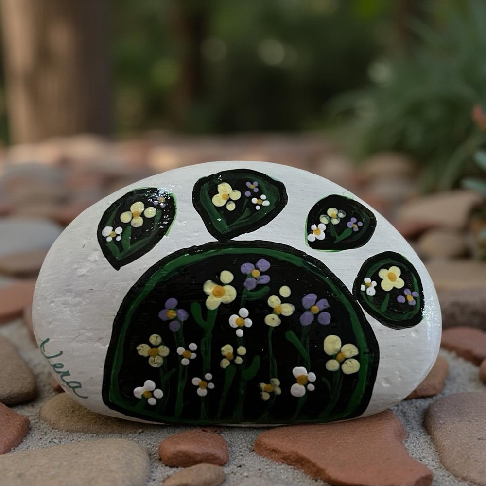 Hand crafted painted floral paw rock white background stone 3x1.5 inch approx